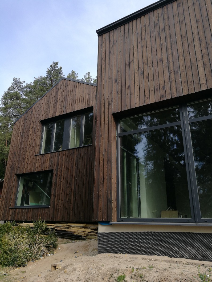 two house projects with Thermowood siding
