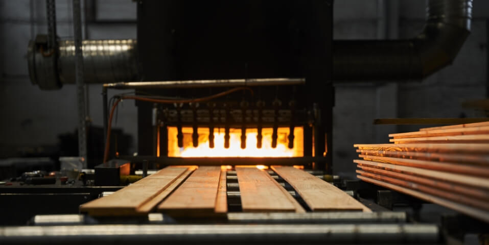 Degmeda factory timber being prepared for charring