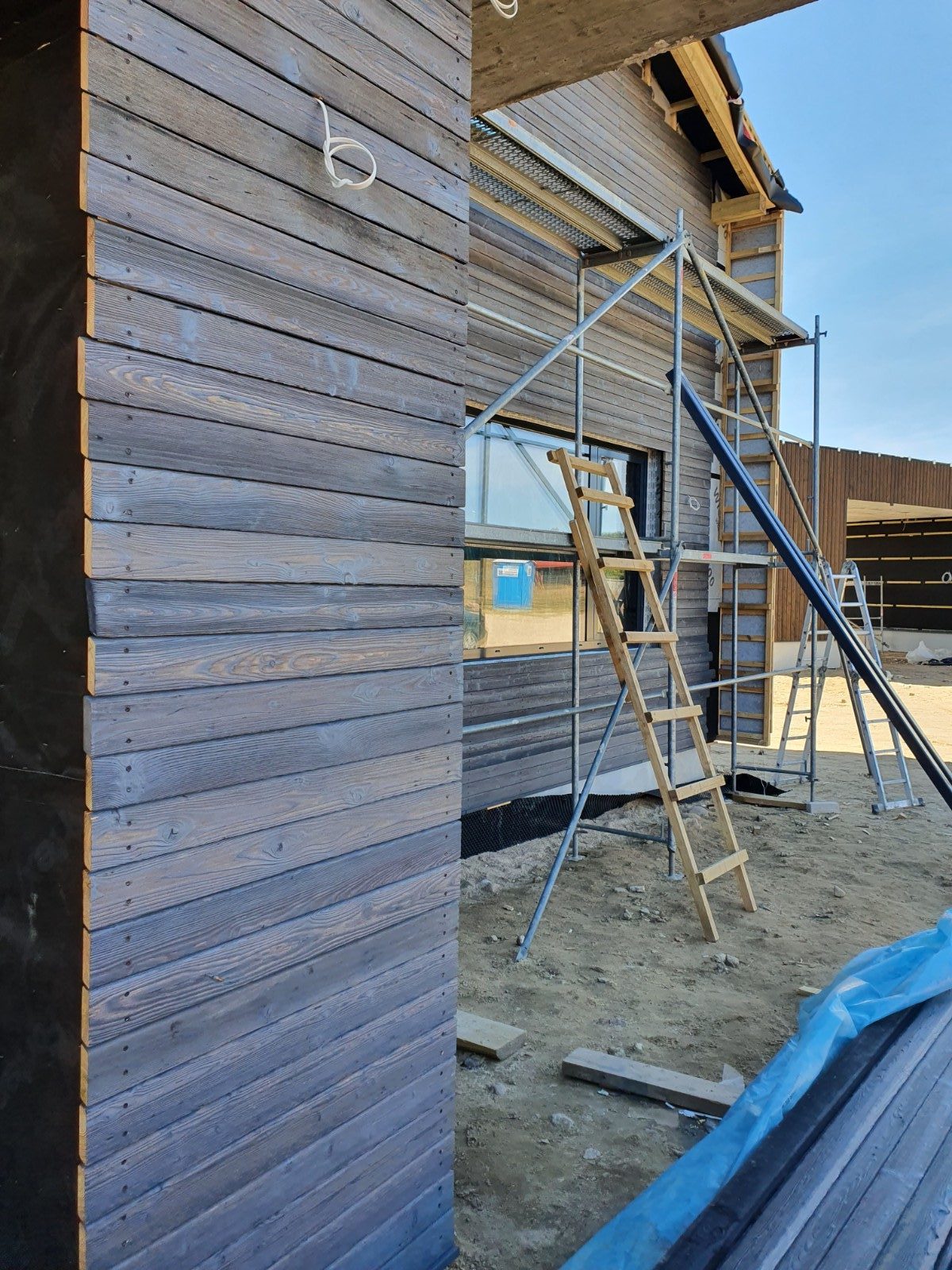 Unfinished house with Cypress siding