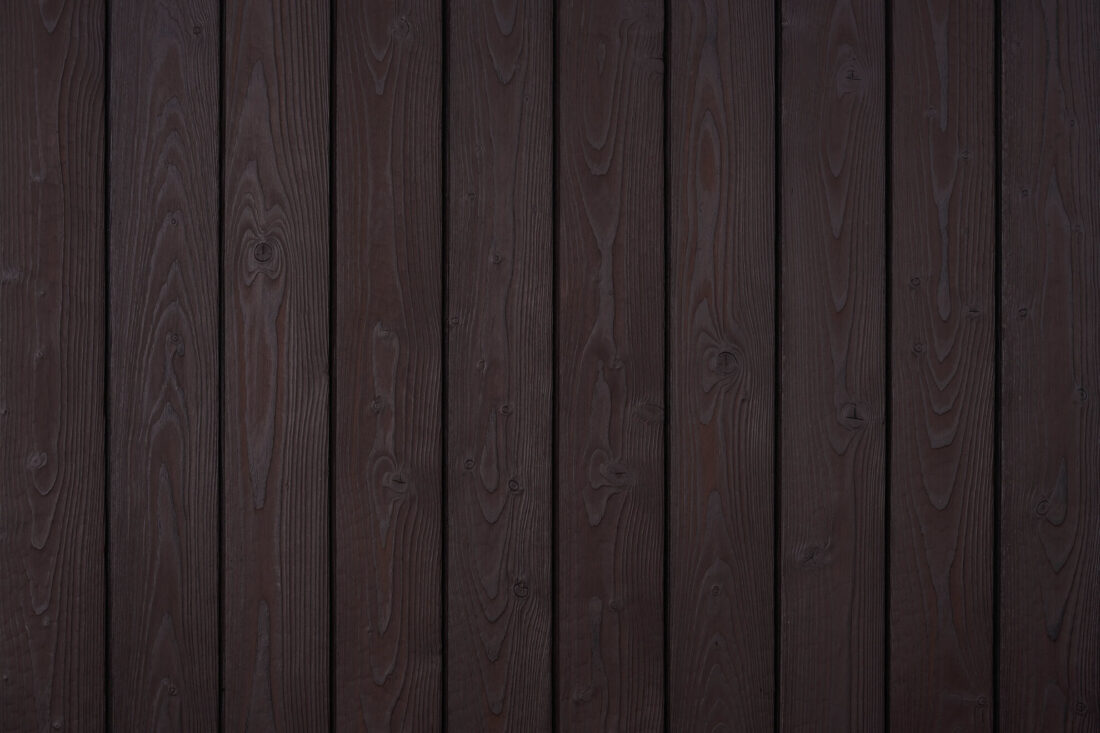 Charred Dark Brown larch boards with a deep brown, almost black surface